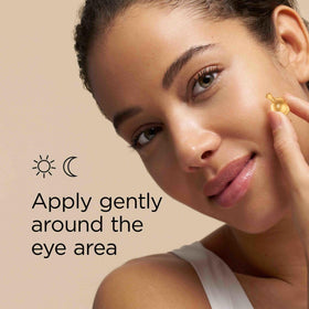 Elizabeth Arden applying serum around eye demonstrating gentle patting for hydration