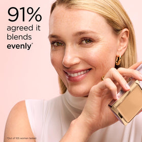 Elizabeth Arden compact in hand to show scale and travel convenience