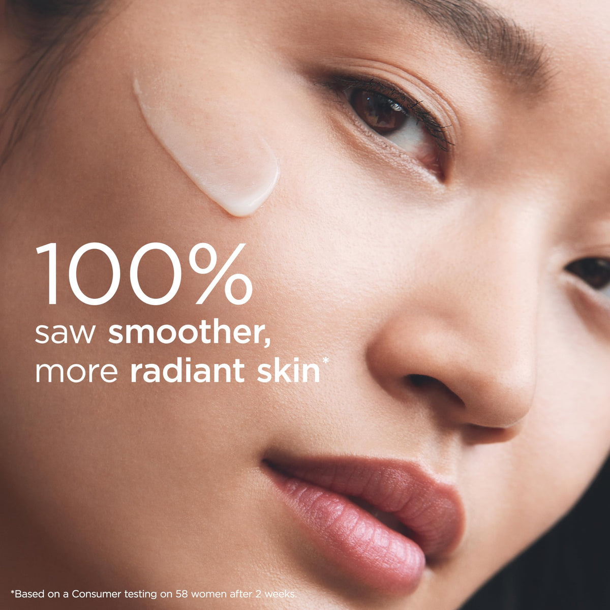 Elizabeth Arden application showing hand smoothing capsule serum onto skin