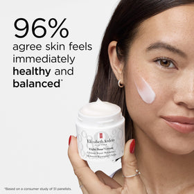 Elizabeth Arden jar in hand demonstrating compact 1.7 fl oz size benefit