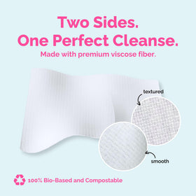 Elizabeth Mott towel next to a coin to show size and travel-friendly compact dimensions