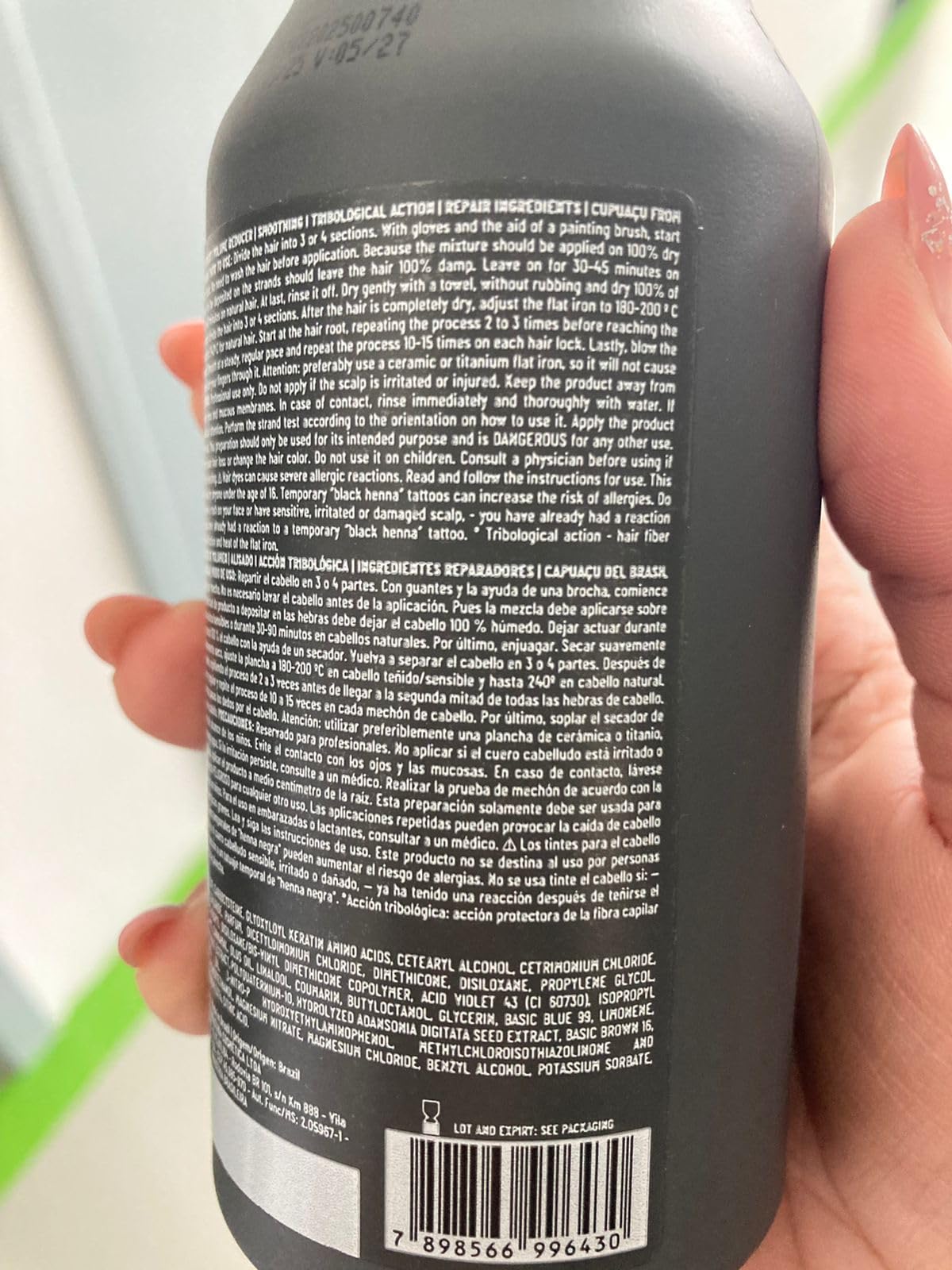 EMAX label close-up highlighting ingredients and nanoplastia benefits for hair