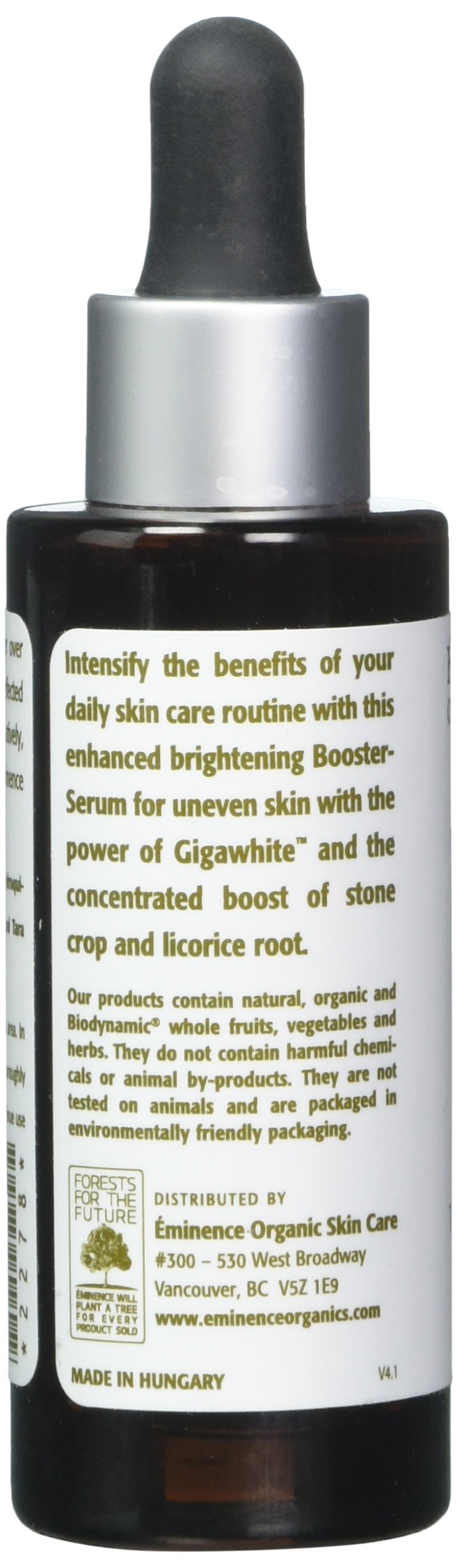 Eminence booster applied to fingertip and cheek showing targeted spot treatment benefit