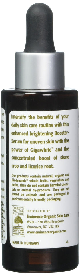 Eminence booster applied to fingertip and cheek showing targeted spot treatment benefit