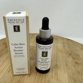 Eminence applying serum to cheek, gentle application soothes sensitized skin benefit