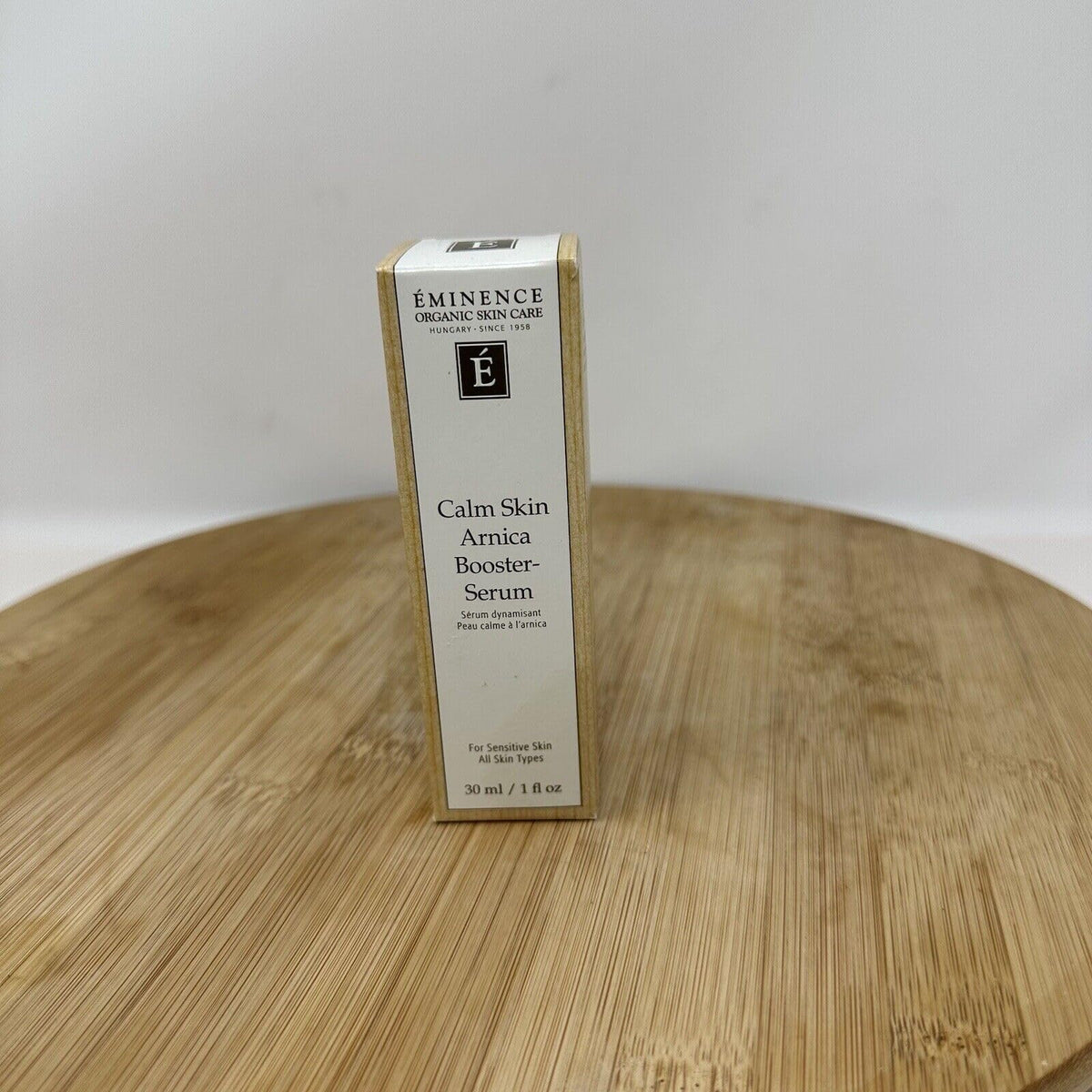 Eminence bottle on bathroom shelf, daily routine-ready elegance and accessibility benefit