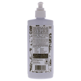 Eminence coconut firming lotion texture close-up highlights creamy hydration benefit