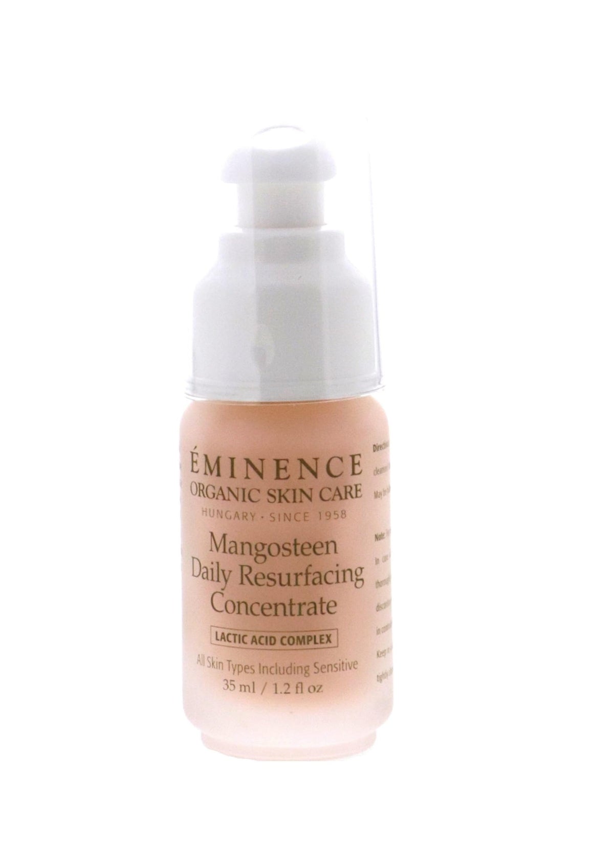 Eminence concentrate texture close-up on fingertip, shows smooth lightweight consistency