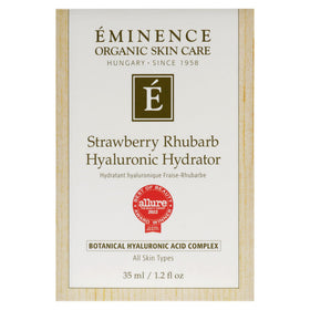 Eminence 1.2 oz jar next to a coin for scale to show compact travel size