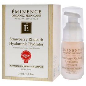 Fresh strawberries and rhubarb beside Eminence jar showing natural botanical ingredients