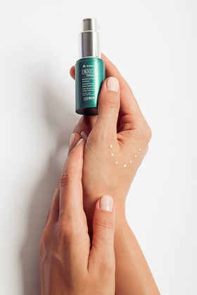 Endocare Tensage on bathroom vanity signaling daily brightening routine