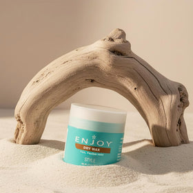 Enjoy wax inside a travel kit showing compact portability benefit