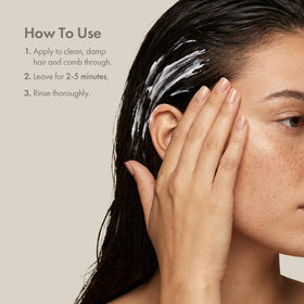Enjoy hair mask next to common objects to illustrate the 8 oz size