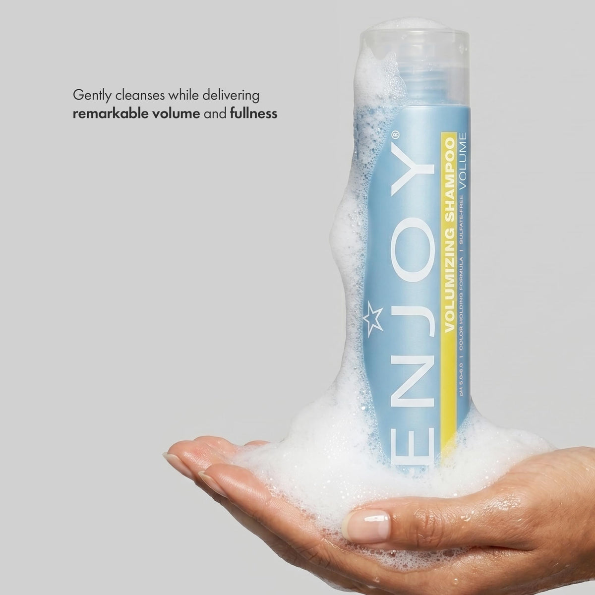 Enjoy label close-up highlighting pH 5.0–6.0 and gentle formulation benefits