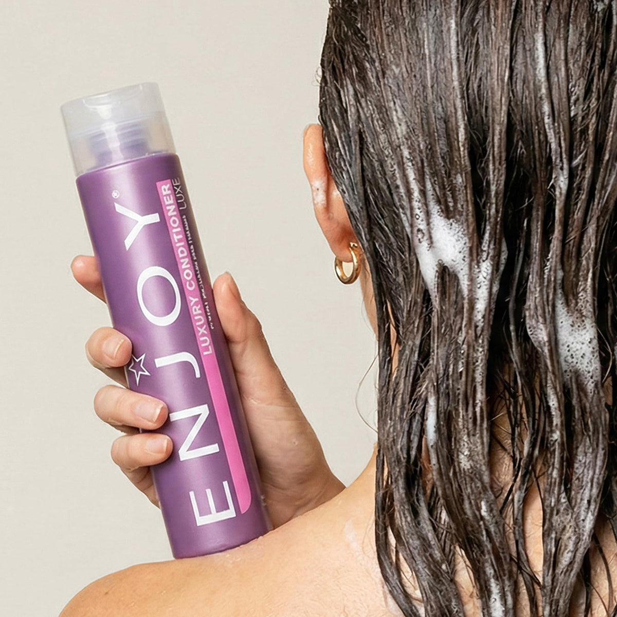 Creamy conditioner texture in hand, Enjoy moisturizing, smoothing visible