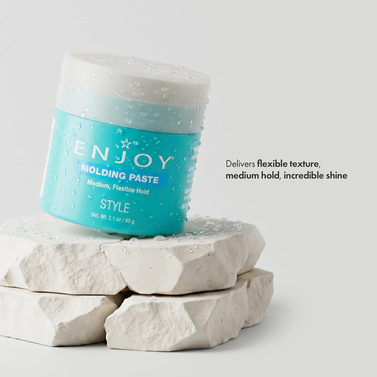 Enjoy molding paste texture close-up demonstrating creamy non-greasy paste for effortless application