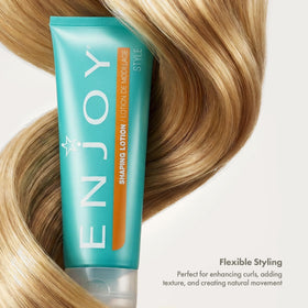 Enjoy styled hair after blow-dry showing soft volume and shine