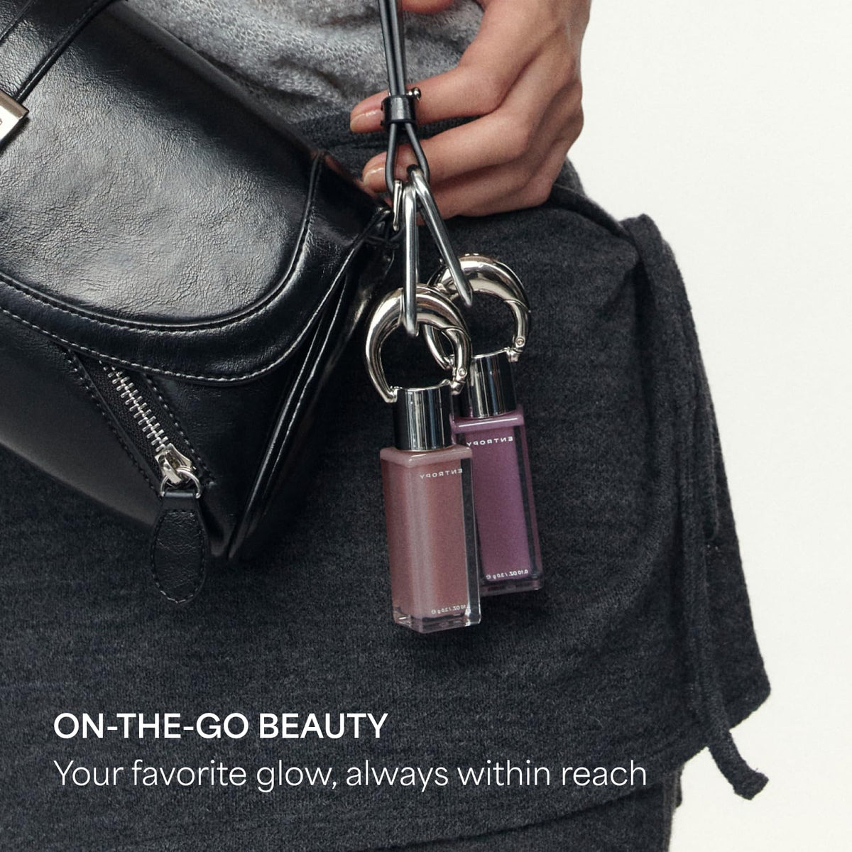 ENTROPY MAKE UP next to a lipstick for clear size and scale reference