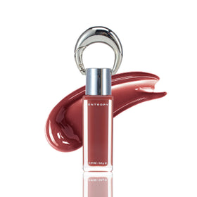 ENTROPY MAKE UP front tube shot showing Amber Charm and benefit of clear branding