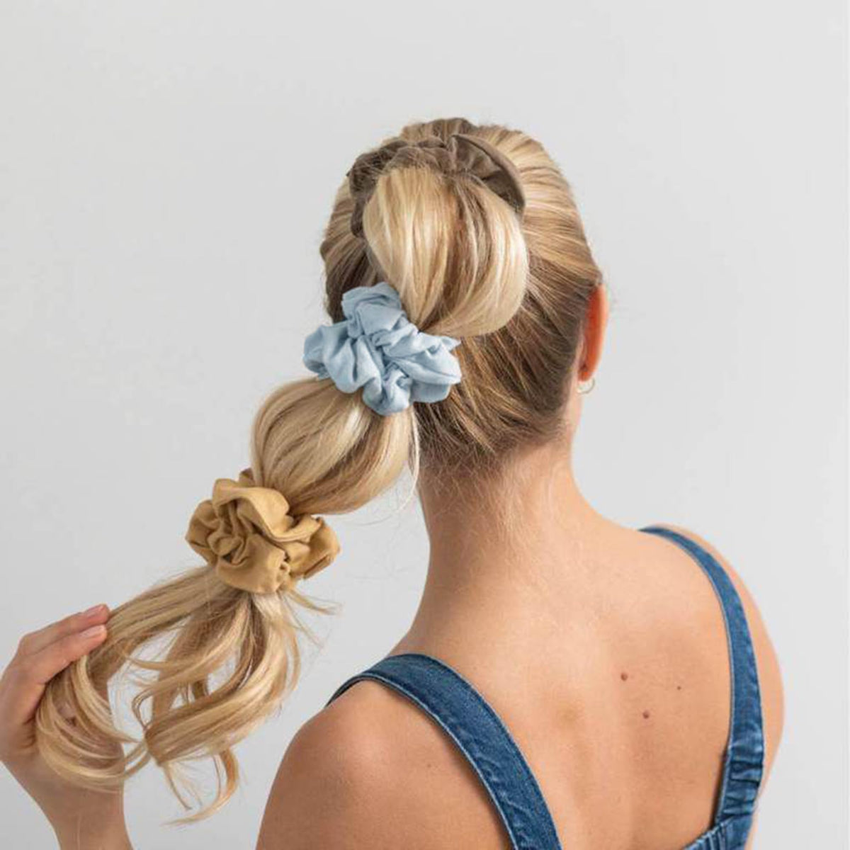EOLUCC scrunchies arranged at bridal party, coordinated photo-ready benefit