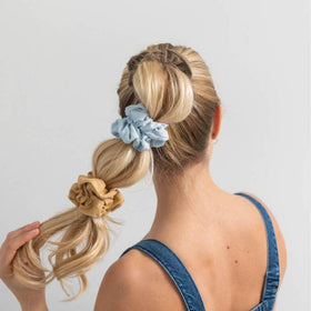 EOLUCC scrunchies arranged at bridal party, coordinated photo-ready benefit