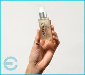 epicuren discovery bottle in hand showing 4 oz size and travel-friendly benefit
