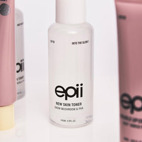 epii bottle next to ruler showing 145mL scale for clear size reference