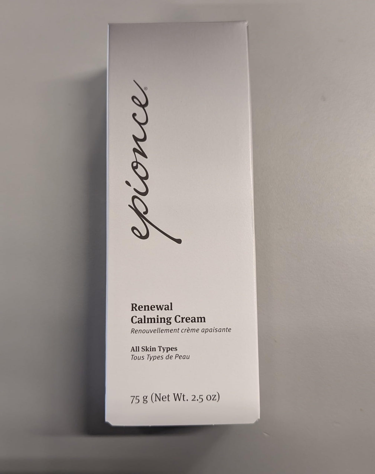 Cream swatch on arm demonstrating Epionce deep moisturizing effect