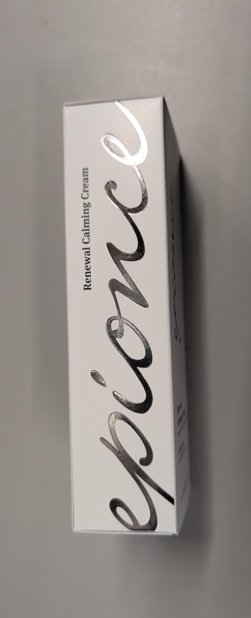 Size comparison showing Epionce cream convenient travel portability