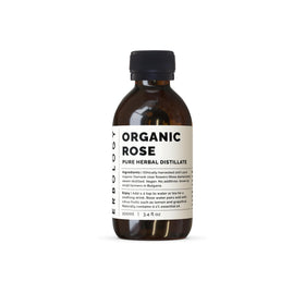 Erbology bottle front view showing label and recyclable glass benefit
