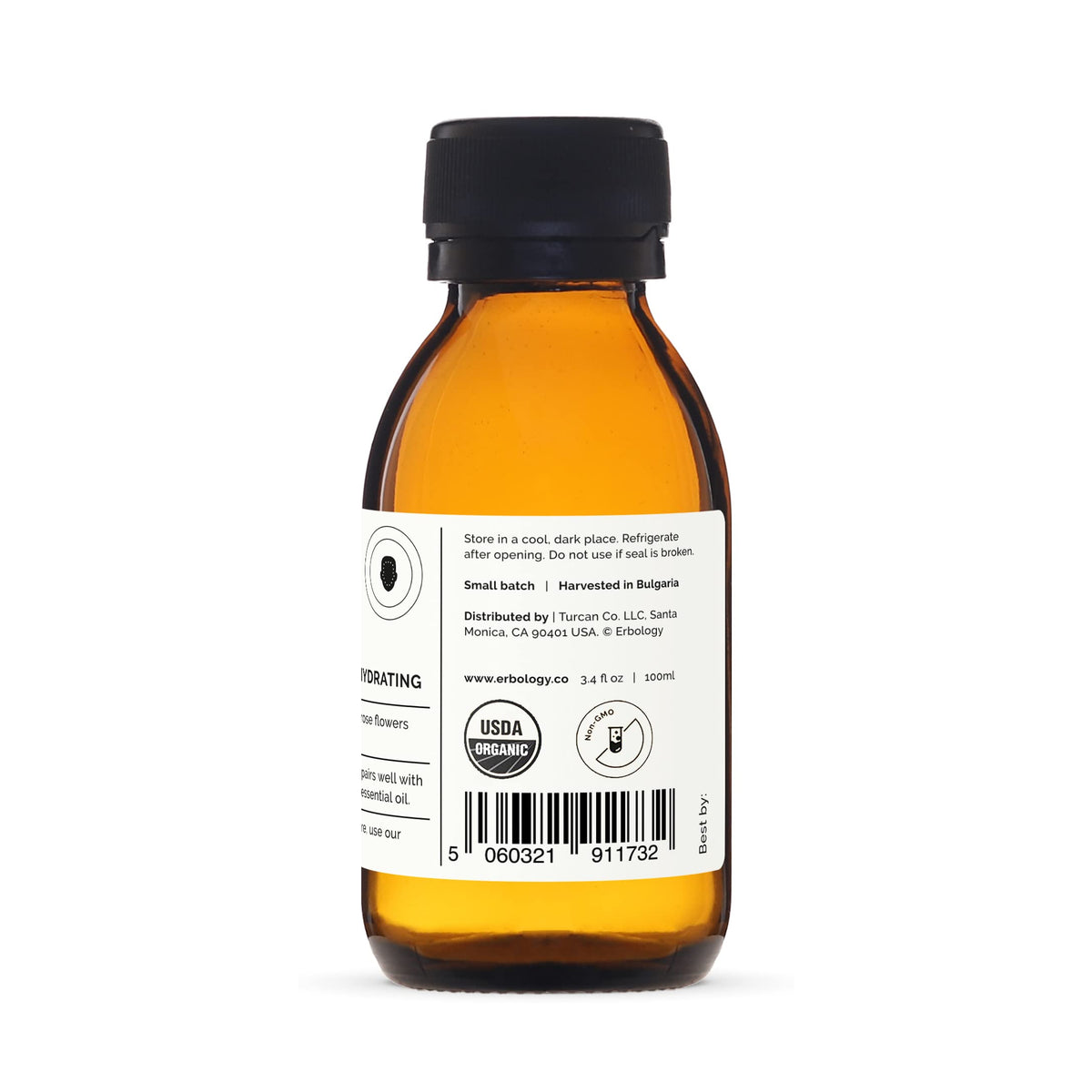 Erbology bottle next to a measuring spoon showing compact travel size