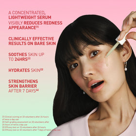 Erborian Centella Red Serum texture close-up on fingertip, highlights lightweight quick-absorbing finish