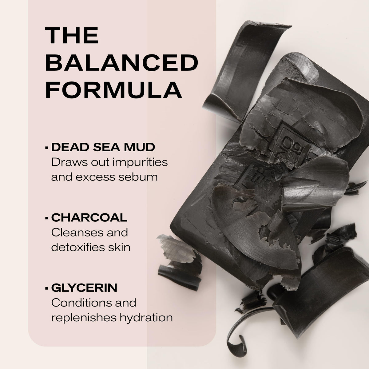 Erno Laszlo bar next to hand showing true 3.4 oz size and portability
