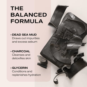 Erno Laszlo bar next to hand showing true 3.4 oz size and portability