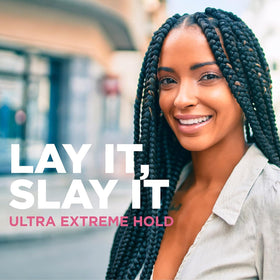 Esha Slick N Slay in a styling setup with tools to show everyday salon use
