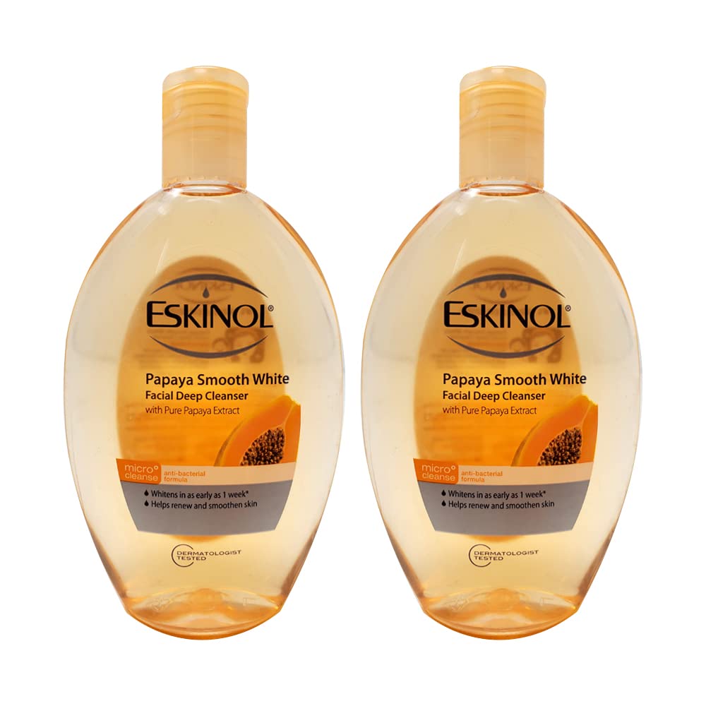 Eskinol front packaging showing two papaya cleanser bottles and clear product benefit