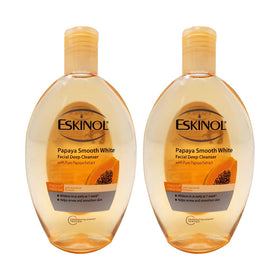 Eskinol front packaging showing two papaya cleanser bottles and clear product benefit