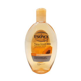 Eskinol size comparison in hand showing 225 ml bottle for scale and travel convenience