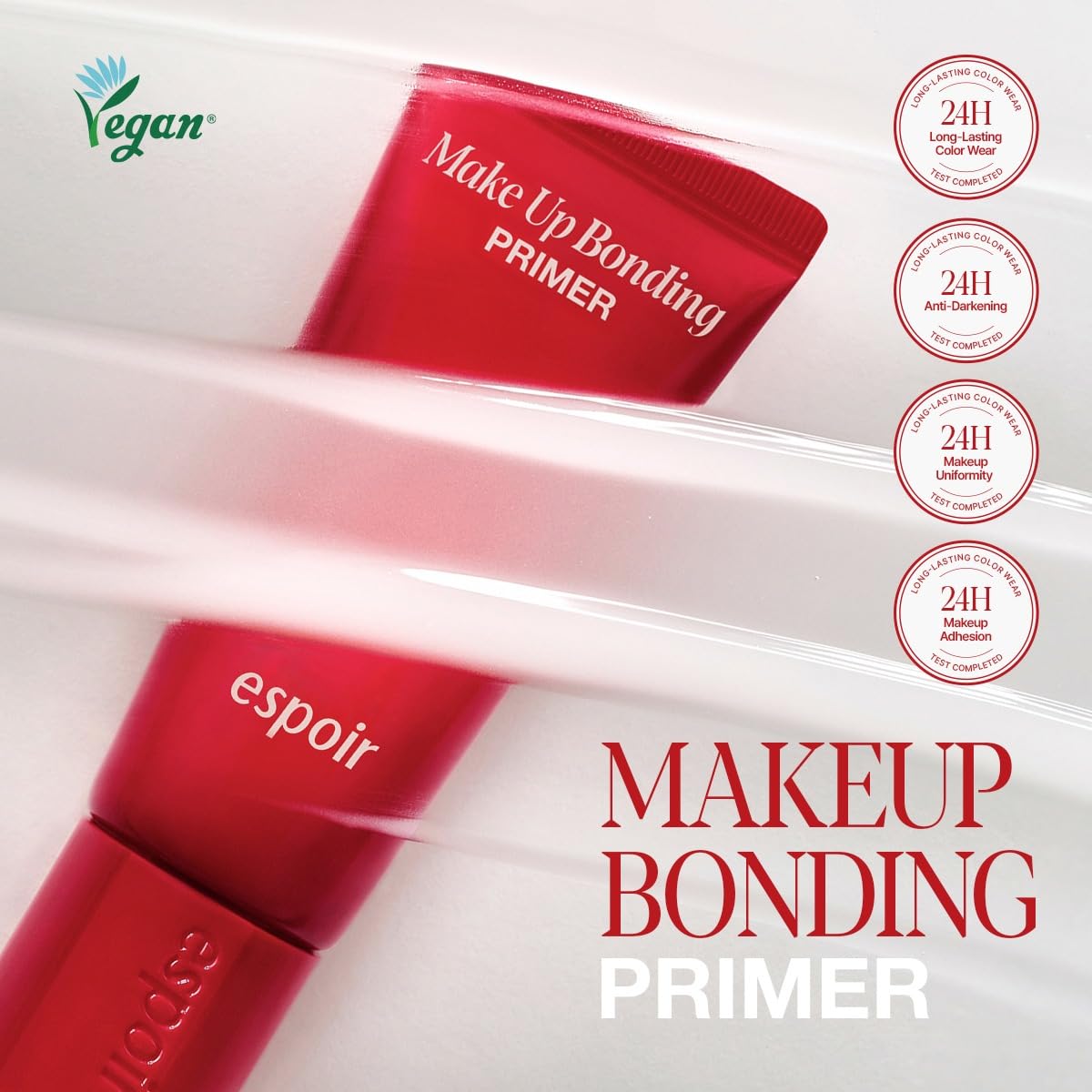 Espoir primer held in hand for scale, demonstrating its 37g travel-friendly size