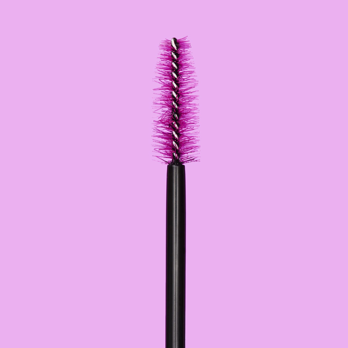 essence applying mascara in-use for long-lasting, flake-free benefit