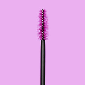 essence applying mascara in-use for long-lasting, flake-free benefit