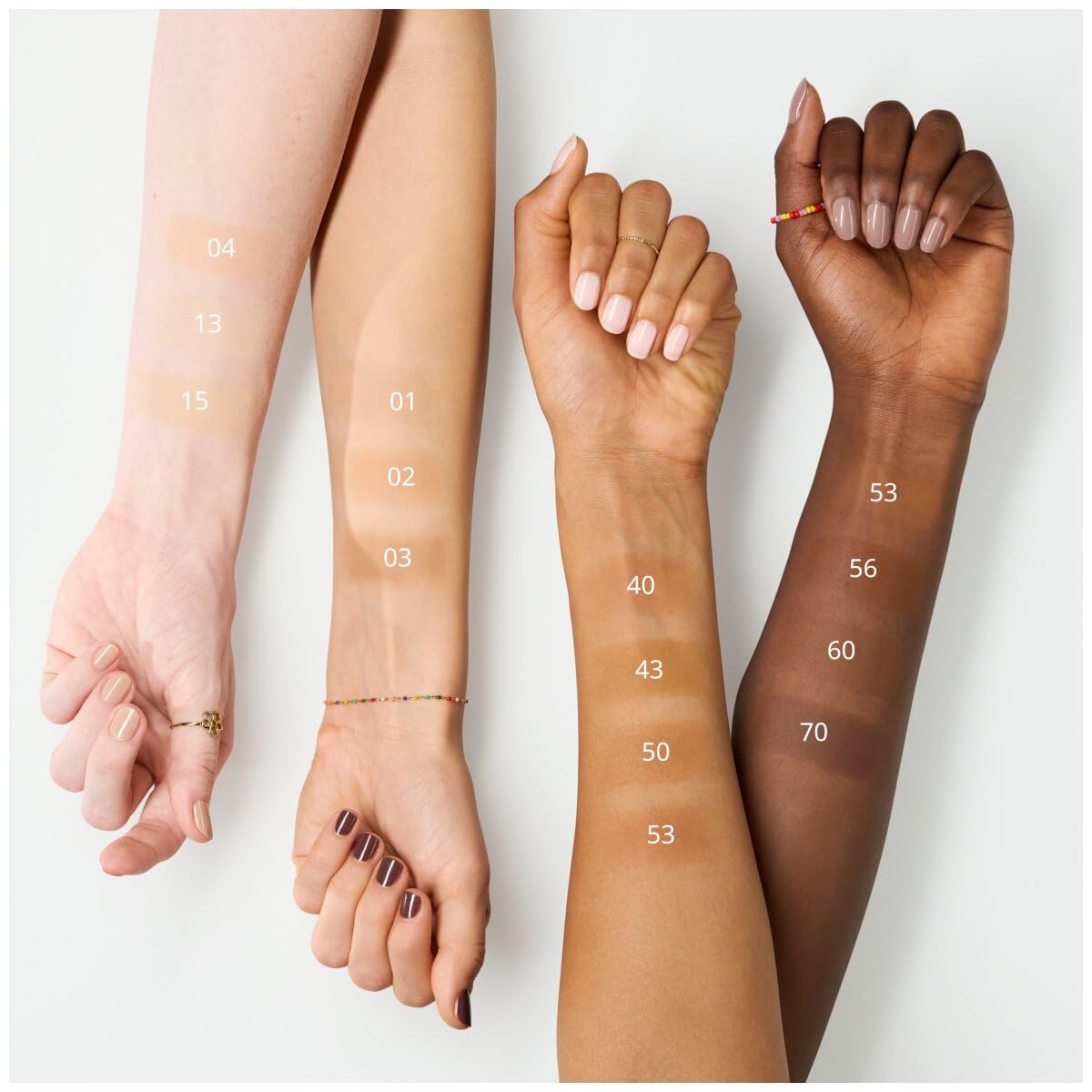 Essence Cosmetics applying mousse to hand to show spreadability and quick, even coverage benefit