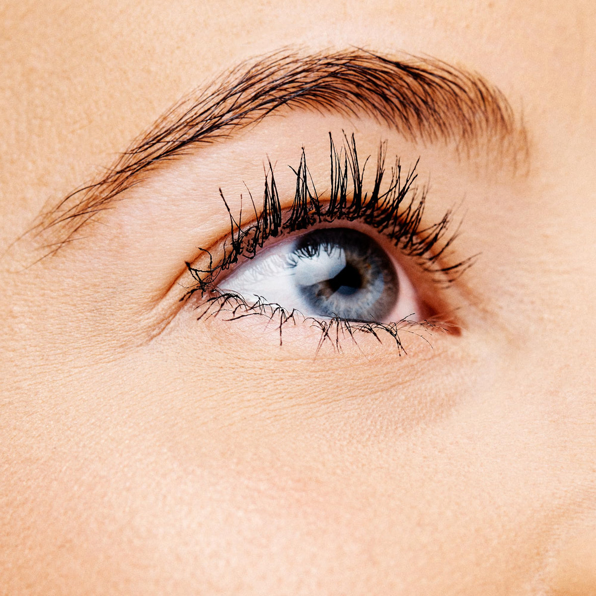 essence Cosmetics open tube showing brush insertion for easy, even coating benefit