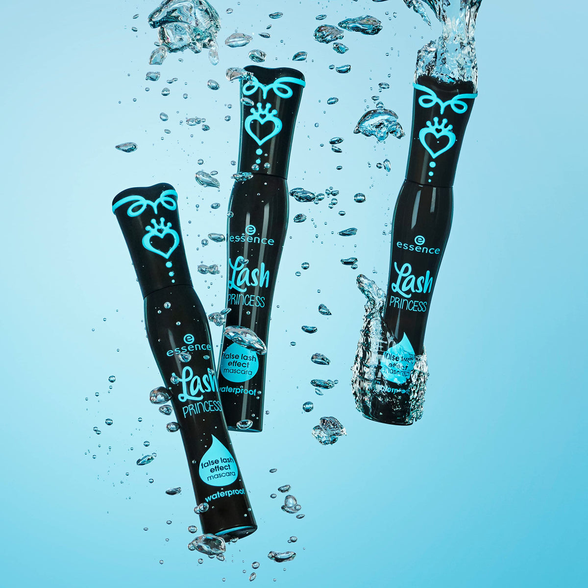essence mascara tube beside hand to show size and travel-friendly benefit