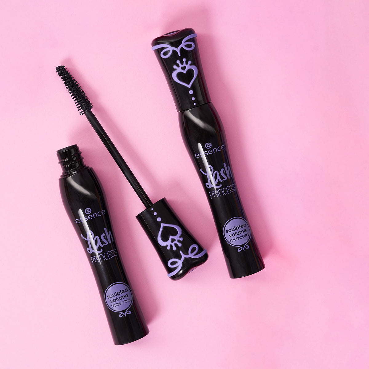 Essence Cosmetics tube beside coin illustrating compact travel-friendly size