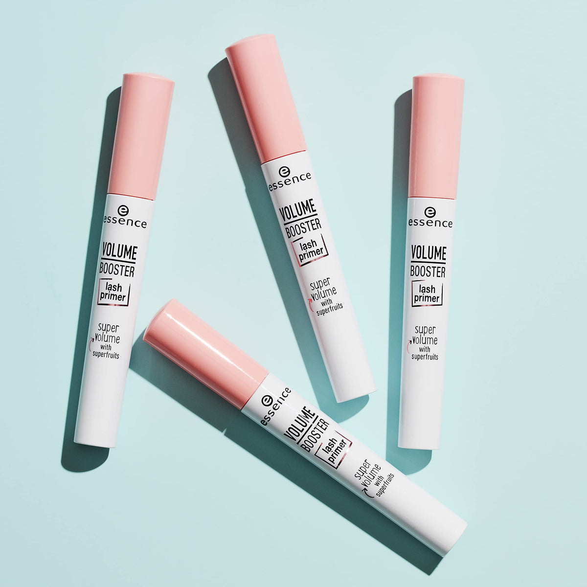 essence application on lashes showing primer layer before mascara for enhanced volume