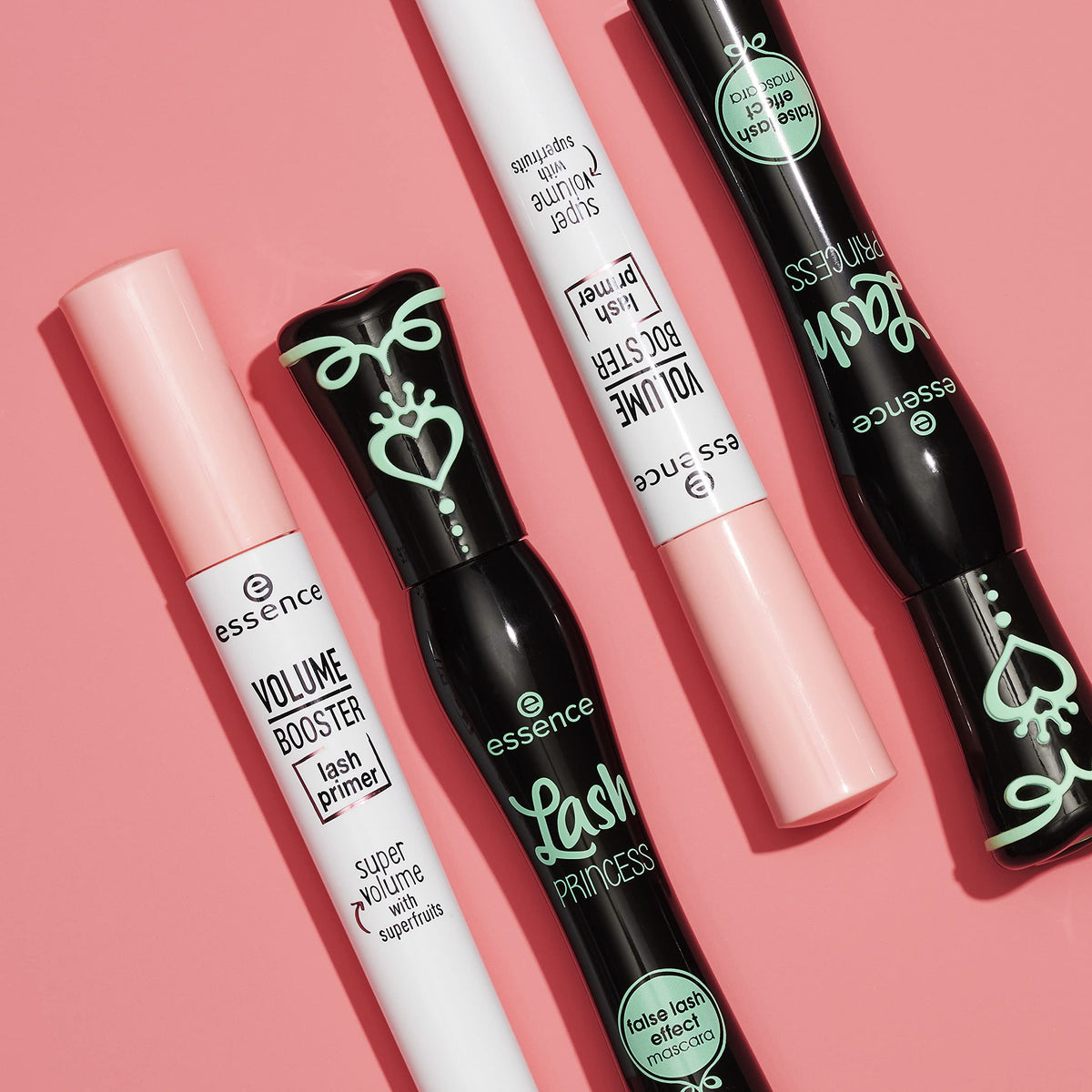 essence hand holding tube to show scale and travel-friendly size for daily use