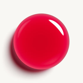 essie swatch painted on nails showing translucent magenta glow benefit: visible glass-like finish