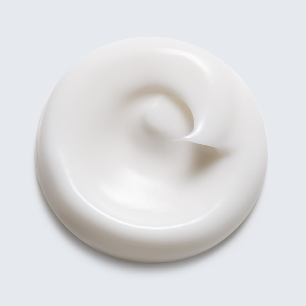 Estée Lauder hand applying cream for immediate softness benefit