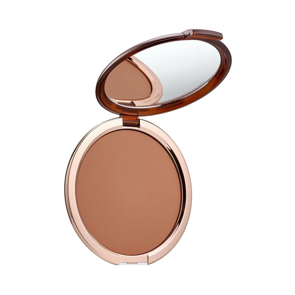 Estée Lauder compact front view showing bronzer and secure packaging for travel
